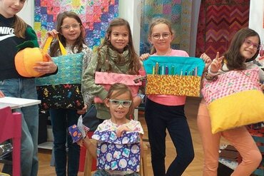 Kinder nähen praktische Dinge